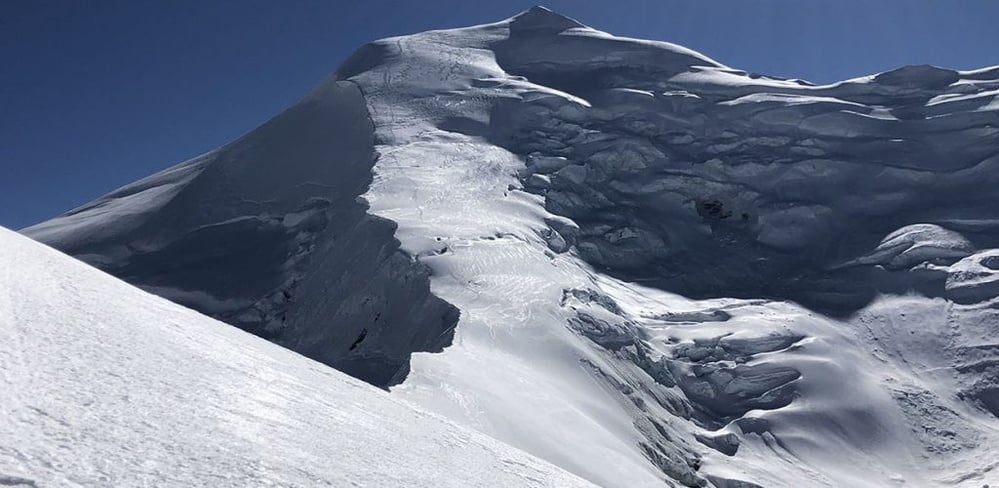 Avalanche kills 2 guides, leaves up to 14 missing at Nepal's Himlung Himal base camp amid deadly monsoon flooding that killed 24