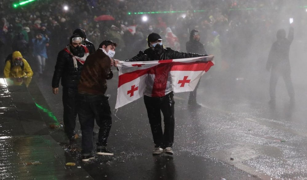 Public protests in Georgia respond to halted EU discussions, revealing deep political divides.