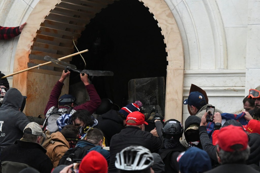 Man who attacked police with poles in Jan. 6 Capitol riot gets 20-year prison sentence