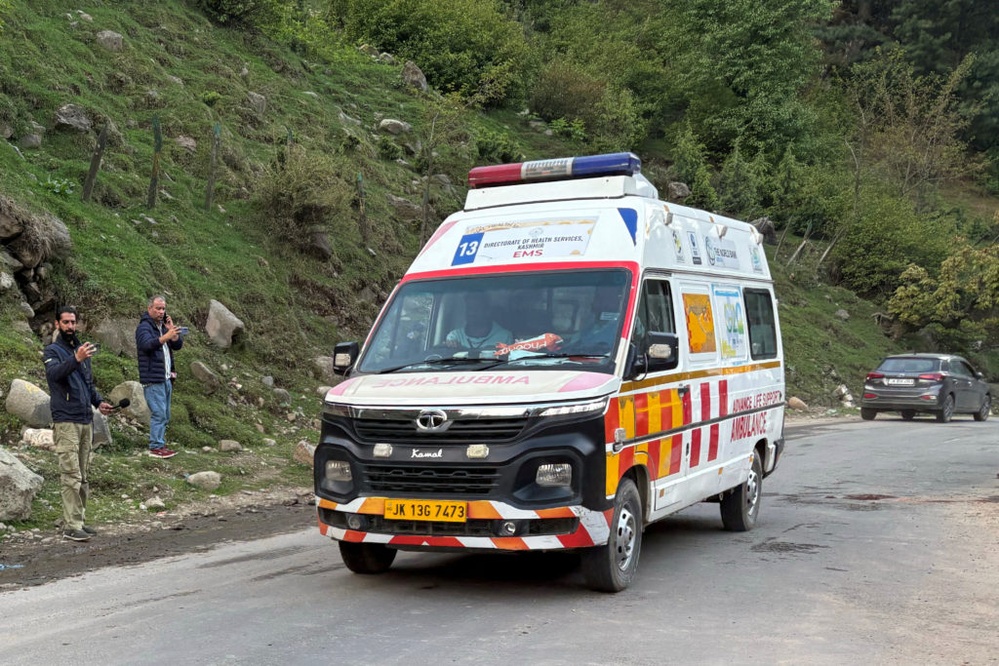 Indian police say gunmen kill at least 20 tourists, wound dozens of others at a Kashmir resort