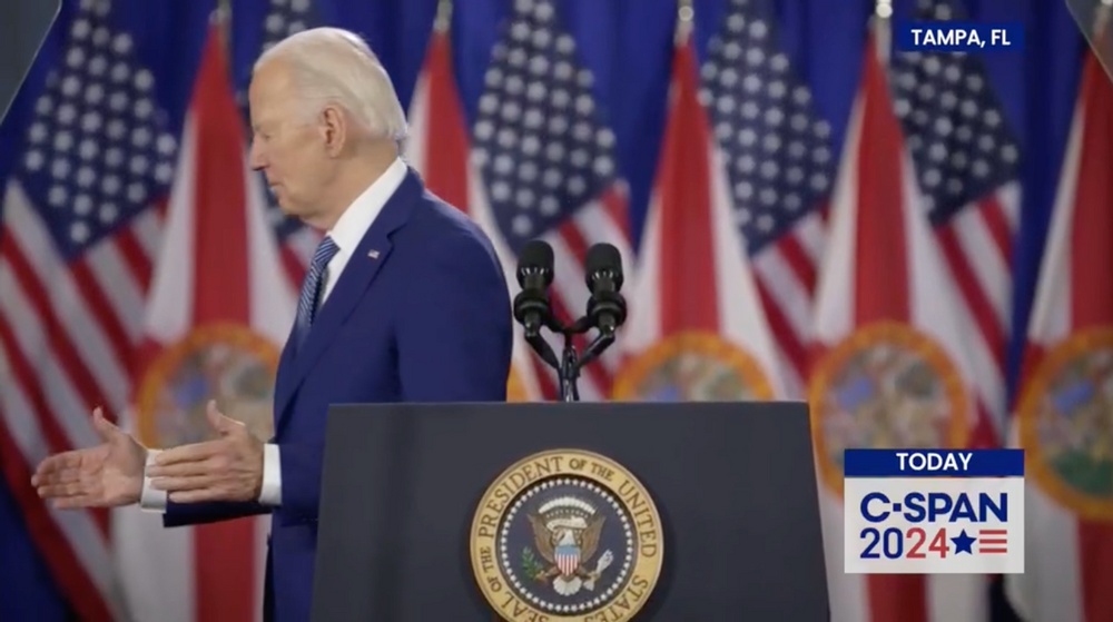 No Proof Video Shows Biden Trying to Shake Hands with a 'Ghost' on Stage