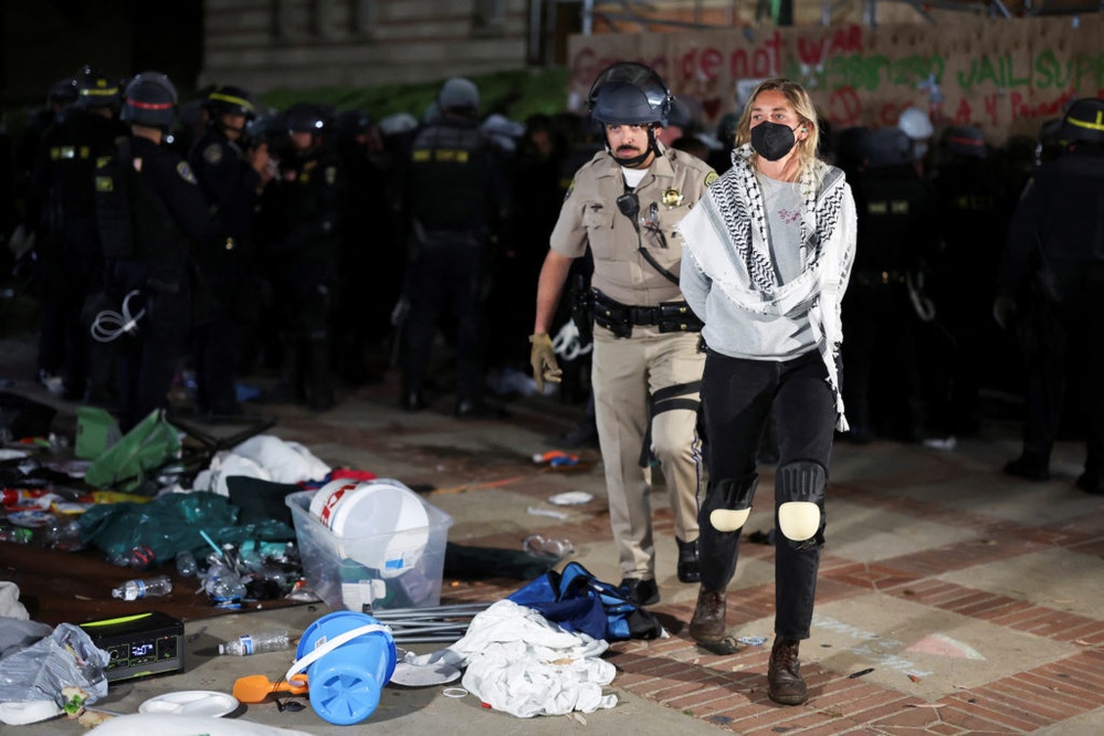 Biden condemns violence and disorder as some college protests escalate into confrontations