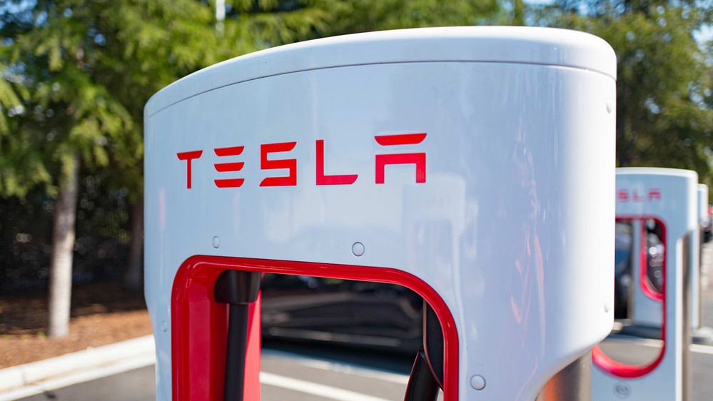Tesla charging standard gains traction. Balanced News