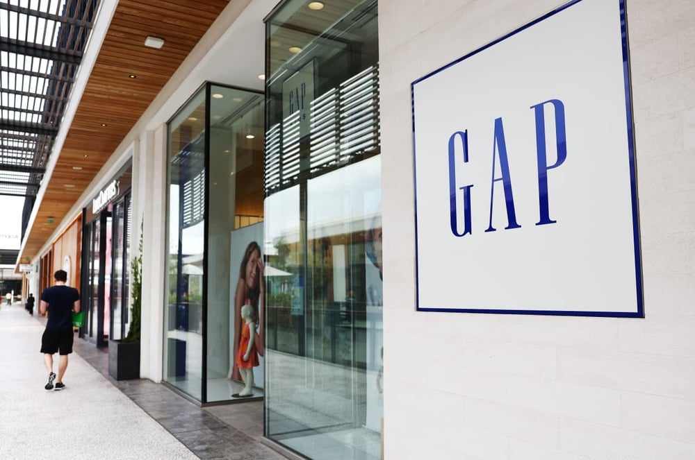 Gap says it picked up wealthier shoppers, and more market share, despite weak clothing demand