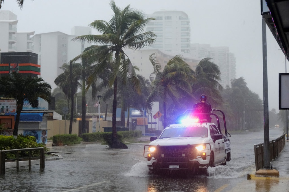 News Wrap: Beryl weakens to tropical storm as it cuts across Mexico's Yucatan Peninsula