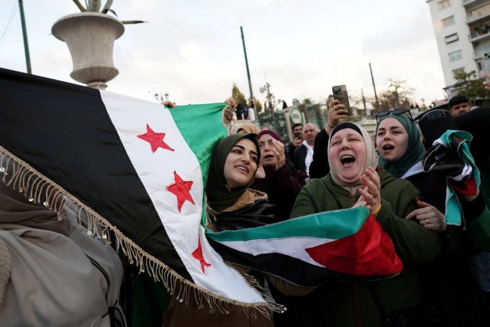 Bashar al-Assad's regime collapses, causing jubilance among Syrians