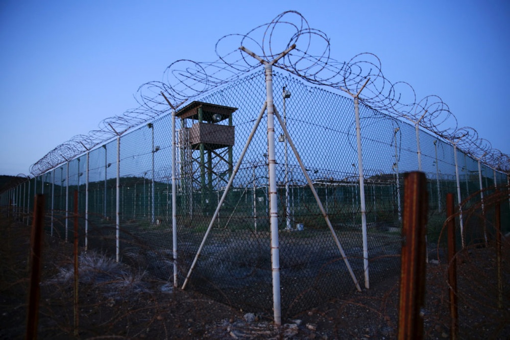 Trump's directive sends migrants to Guantanamo Bay amid major criticism.