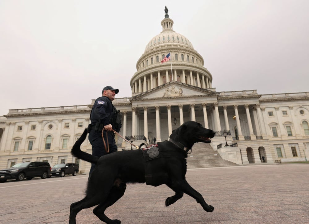 Rejecting Trump's demands, Congress averts government shutdown just after midnight