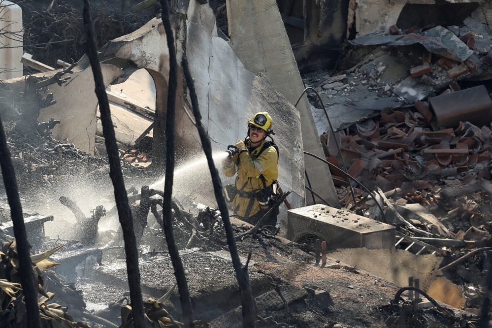 LA wildfires destroy 10,000 structures, 10 dead, insurers retreat