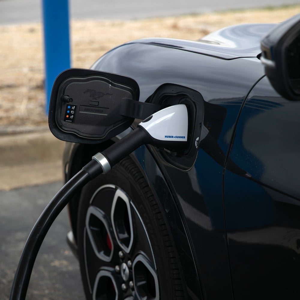 Automakers recalibrate EV investments amidst market and regulatory pressures.