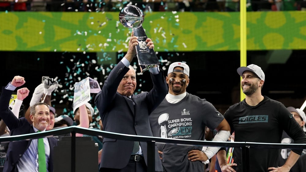 Eagles win Super Bowl, contemplate White House visit amid political tensions.