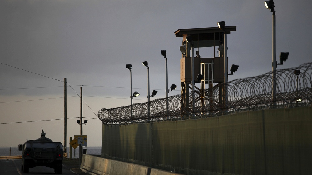 Trump uses Guantanamo Bay for migrant detention, sparking human rights debate.