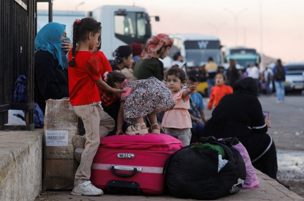 Thousands flee into Syria from Lebanon as conflict worsens between Hezbollah and Israel