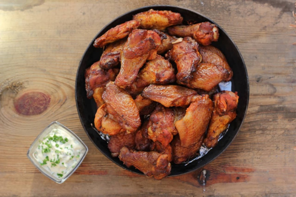 On Super Bowl Sunday, Americans will devour 1.45 billion chicken wings. But are they an appetizer or an entree?