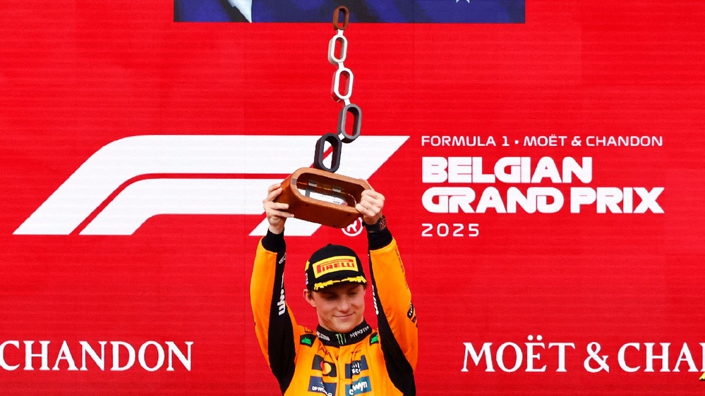 Piastri wins, extends lead after delayed, weather-impacted Belgian Grand Prix.