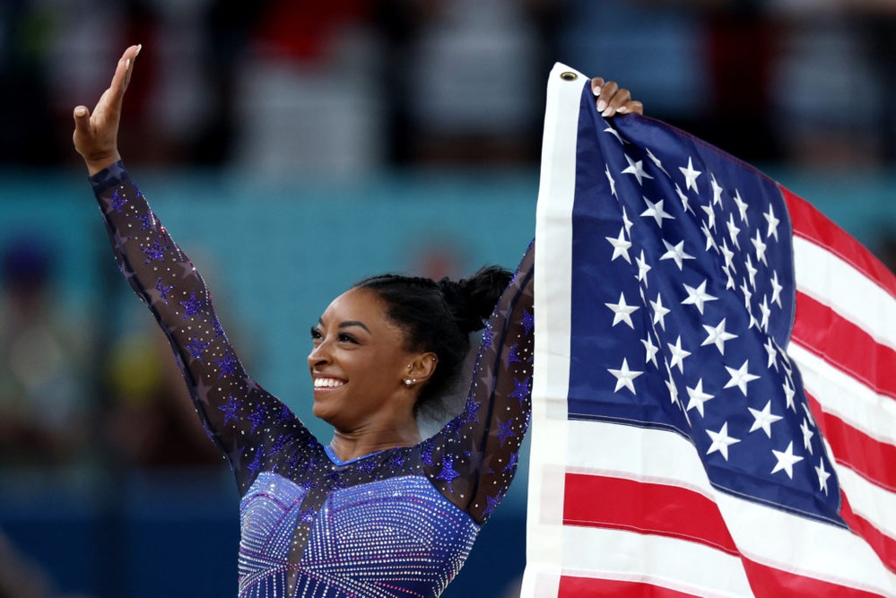 Simone Biles holds off Brazil's Rebeca Andrade to win all-around gold in women's gymnastics