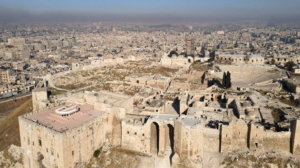 Military conflict escalates with rebels capturing Aleppo, increasing regional instability.