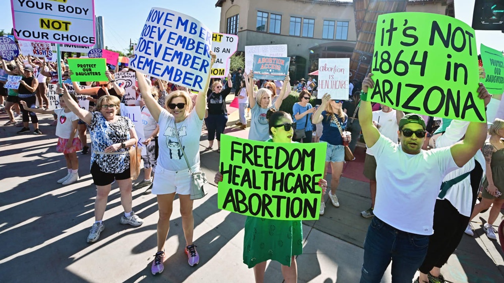 Arizona's enforces 1864 abortion ban sparking intense political and public debate.
