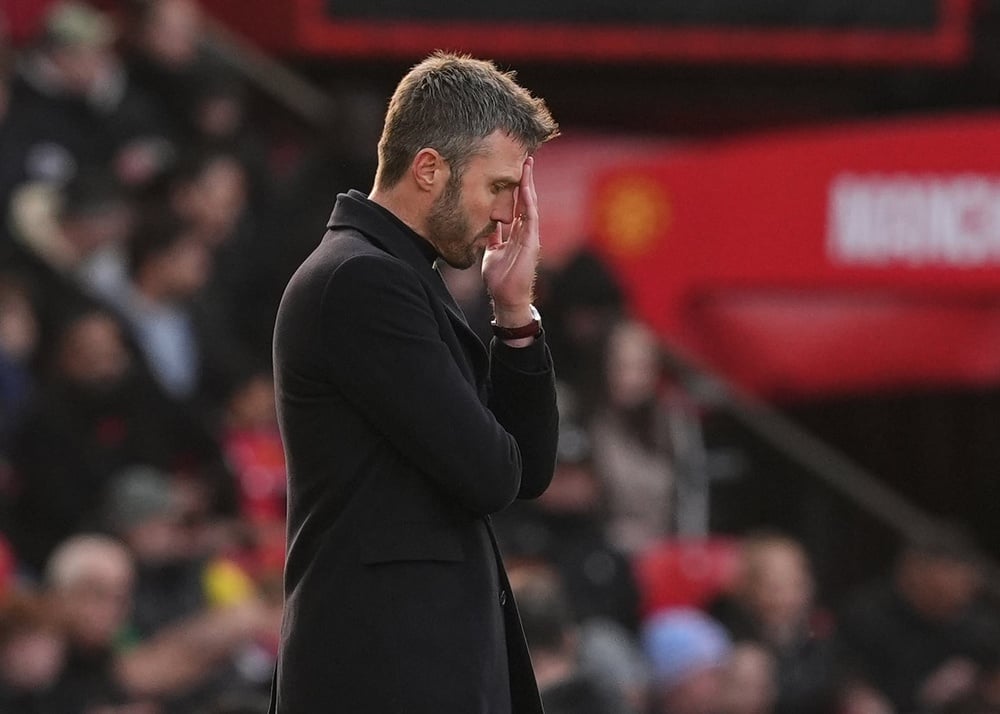 Manchester United lose 3–0 at home to Bournemouth, extending the winless run to eight games and leaving Michael Carrick's job hanging by a thread Balanced News