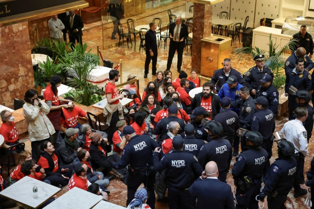 Protests erupt over activist's ICE detention; 100 arrested at Trump Tower.