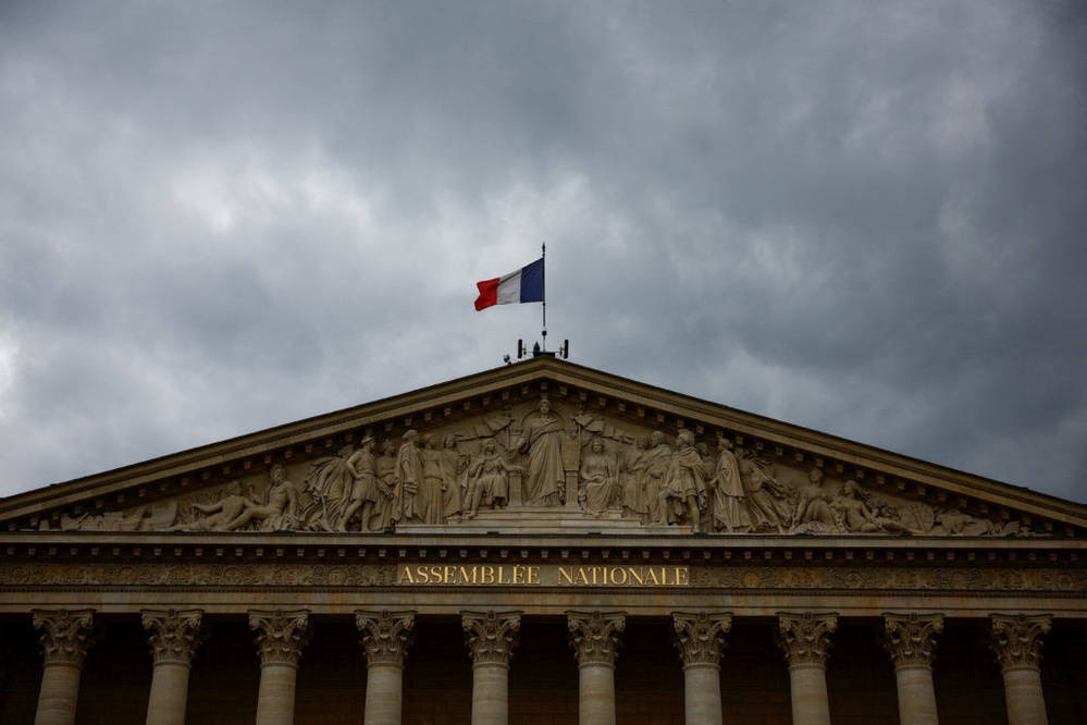 French opposition parties make deals in attempt to block landslide victory for far-right National Rally