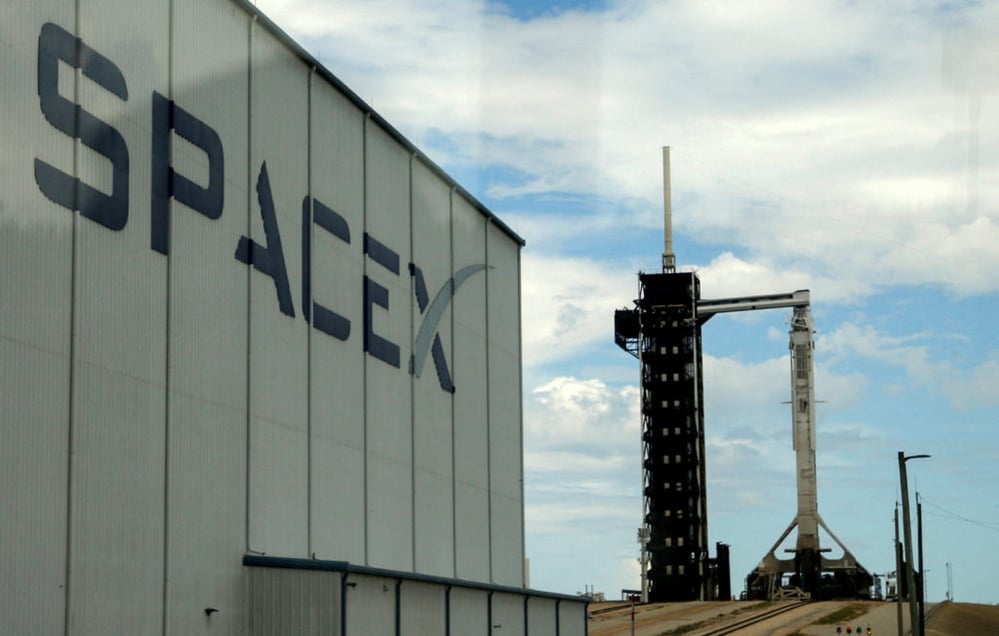 FAA grounds SpaceX after one of its rockets falls over in flames during landing