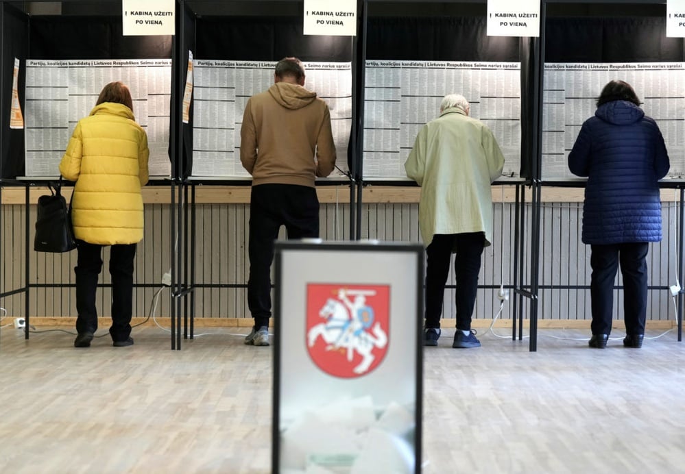 Lithuania begins parliamentary election as many voters look for change despite strong economy