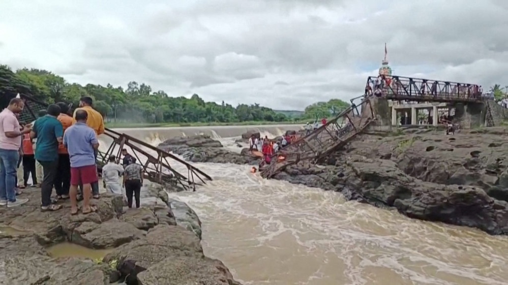 Bridge collapse at tourist spot in western India leaves at least 2 dead, 32 injured