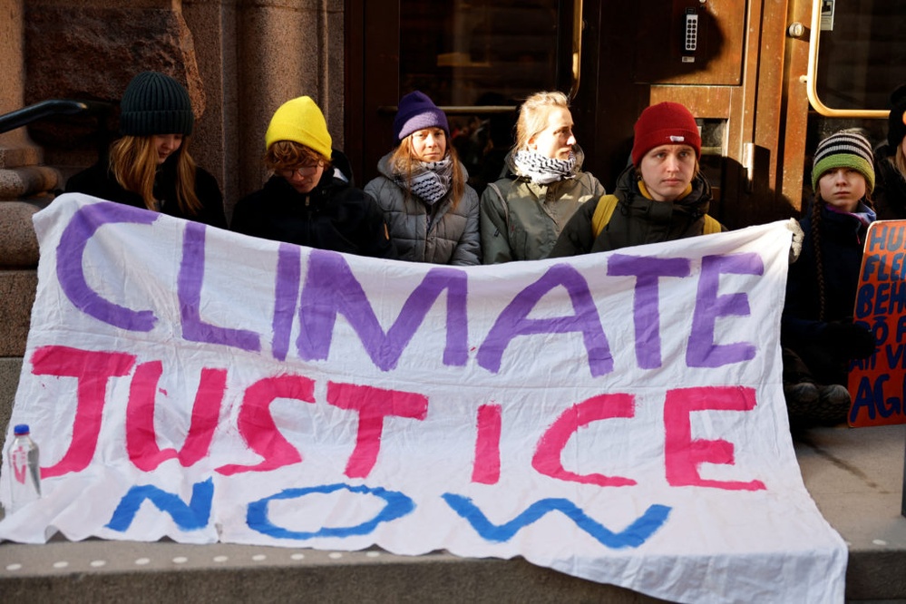 Greta Thunberg and other climate activists block entrance to Swedish parliament