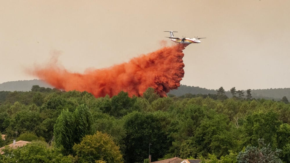 Wildfires drove mass evacuations and triggered unprecedented cross-border firefighting assistance
