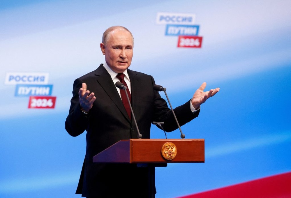 Putin wins fifth term, reasserts aggressive stance