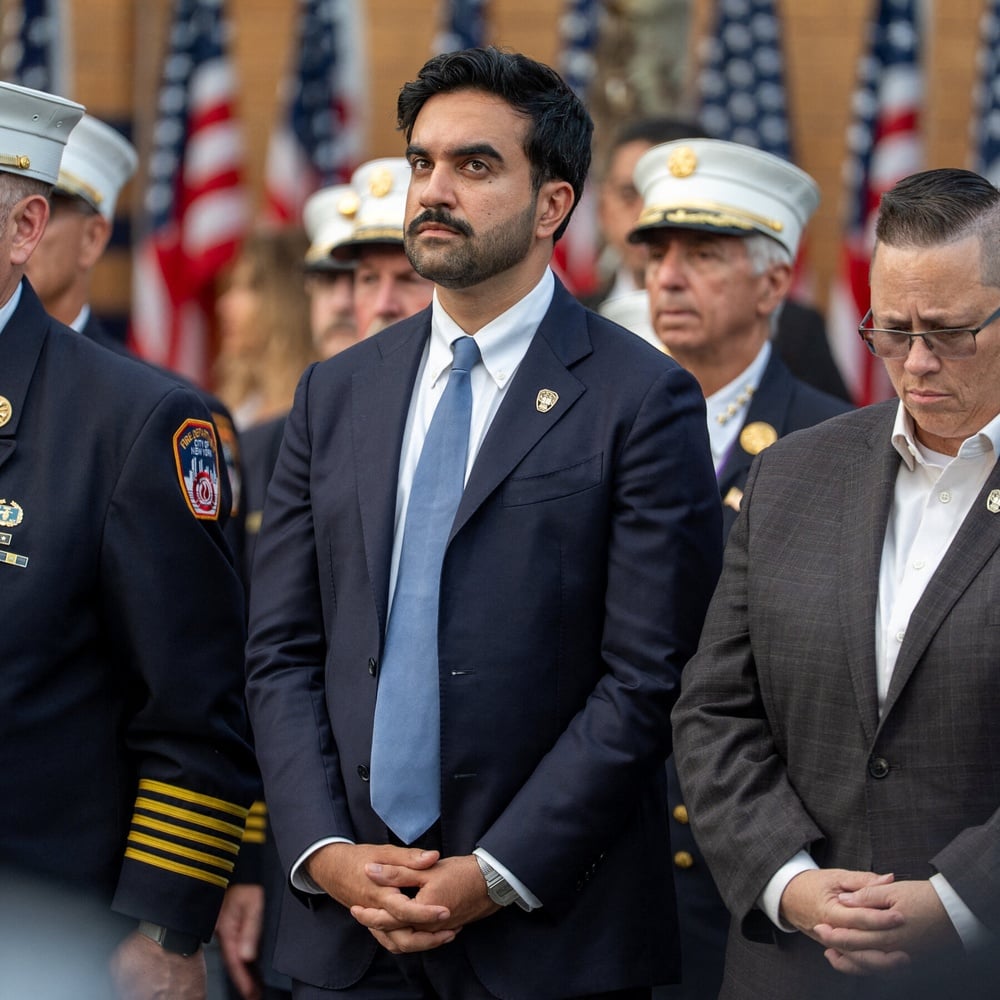 Viral video of Mamdani and AOC smiling during Ground Zero's 25th-anniversary name-reading ignites Cruz condemnation amid 100,000-signature petition against his attendance