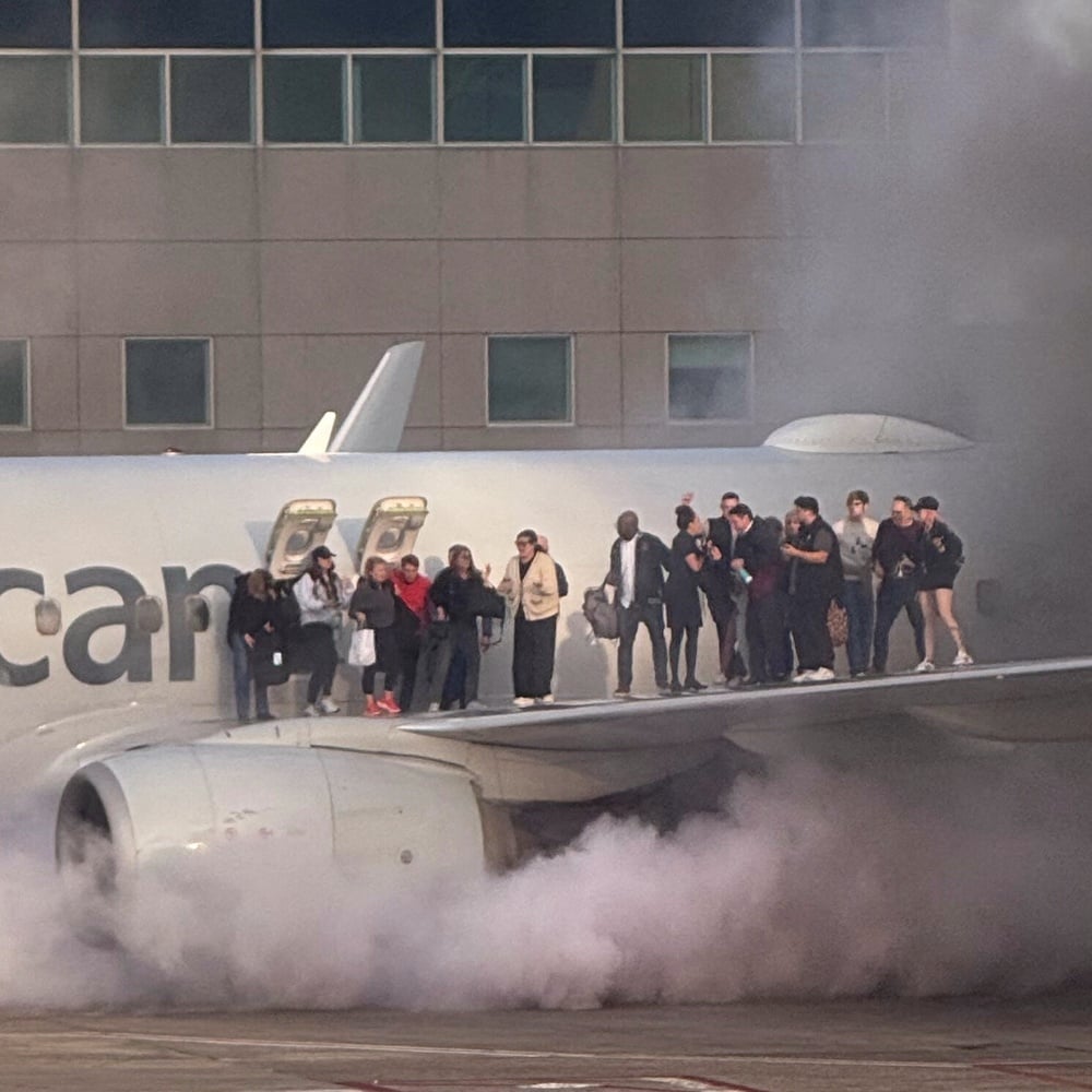 American Airlines plane caught fire during emergency landing at Denver airport.