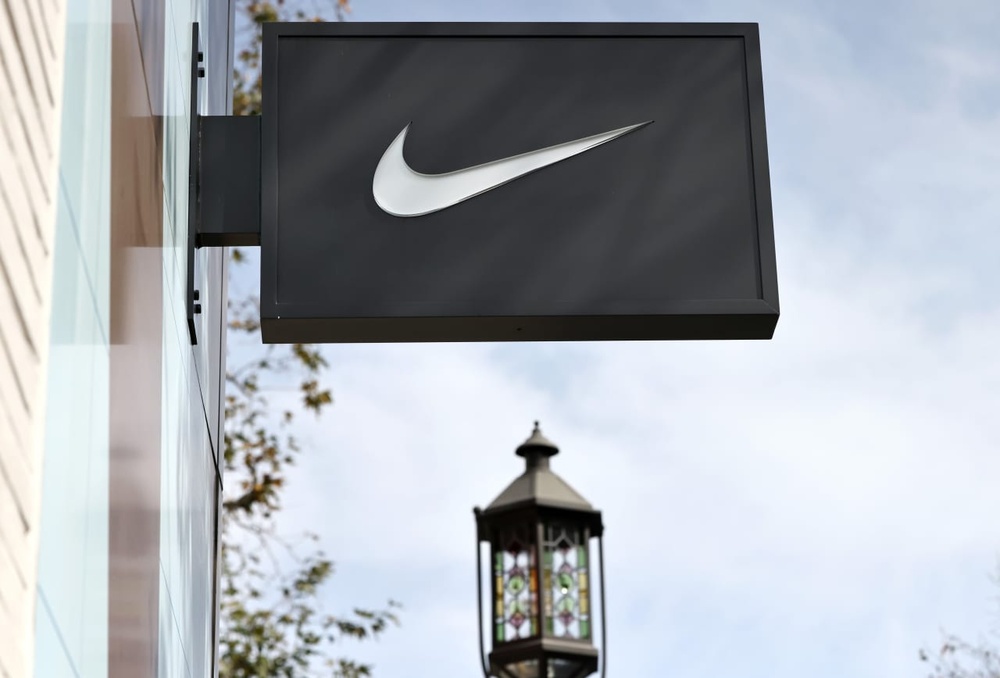 Nike tries to rip off the band-aid for investors. Its stock price is feeling the sting