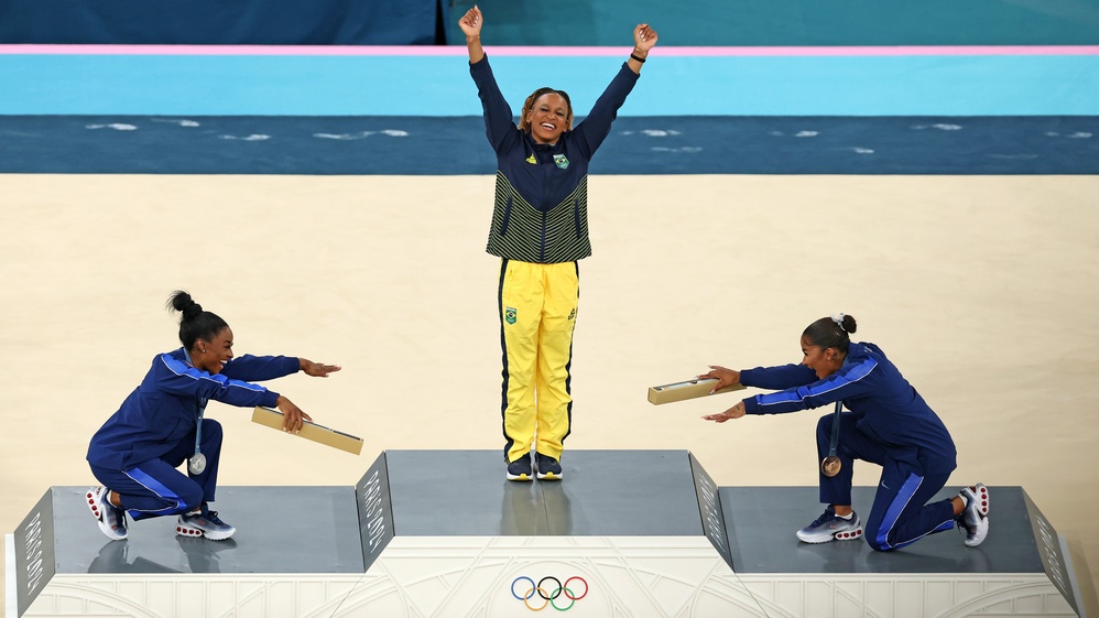 Olympics Photo of the Day: Respect, Recognition, and Joyful Support