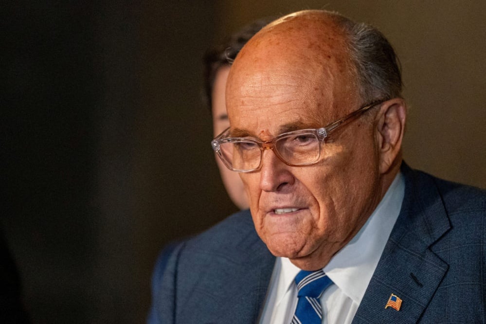 Giuliani held in contempt for election worker defamation.