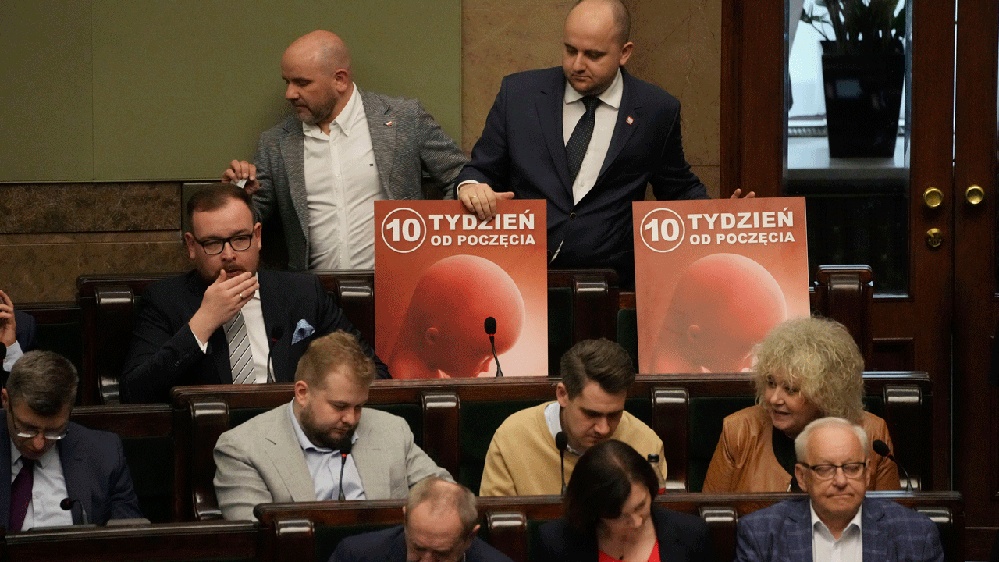 Polish lawmakers vote to move forward with work on lifting a near-total abortion ban