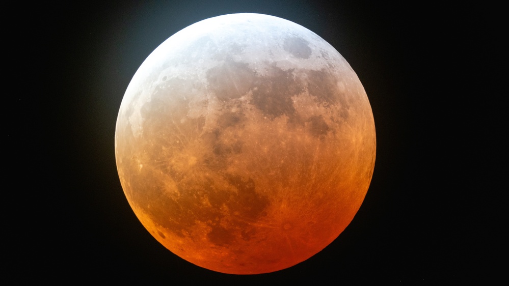 'Blood moon' total lunar eclipse: Stunning photos of our celestial neighbor turning red over the Americas