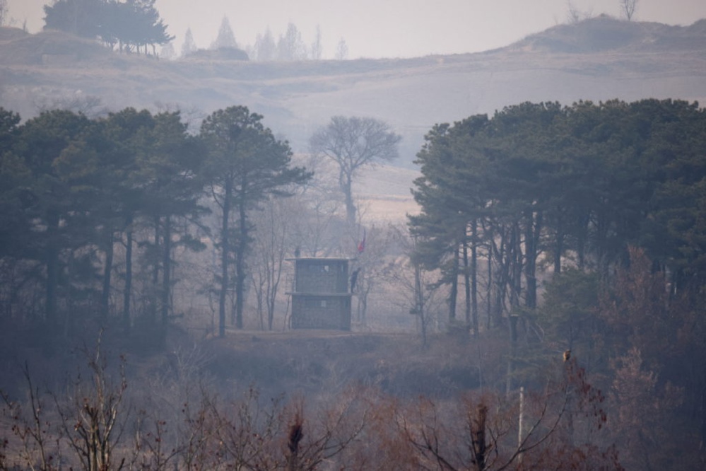 North Korean soldiers accidentally crossed the DMZ, causing South Korea to fire warnings