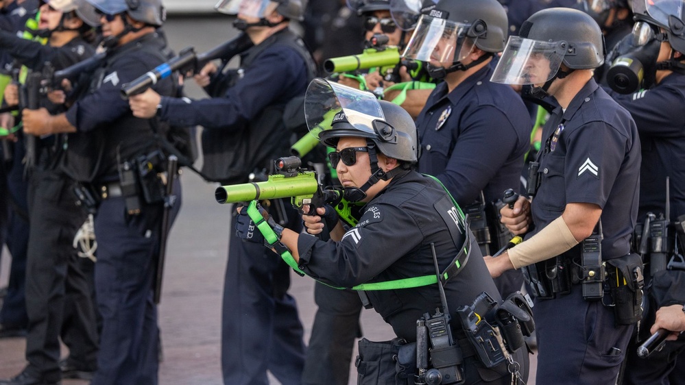 Protests in L.A. over ICE raids lead to military intervention.
