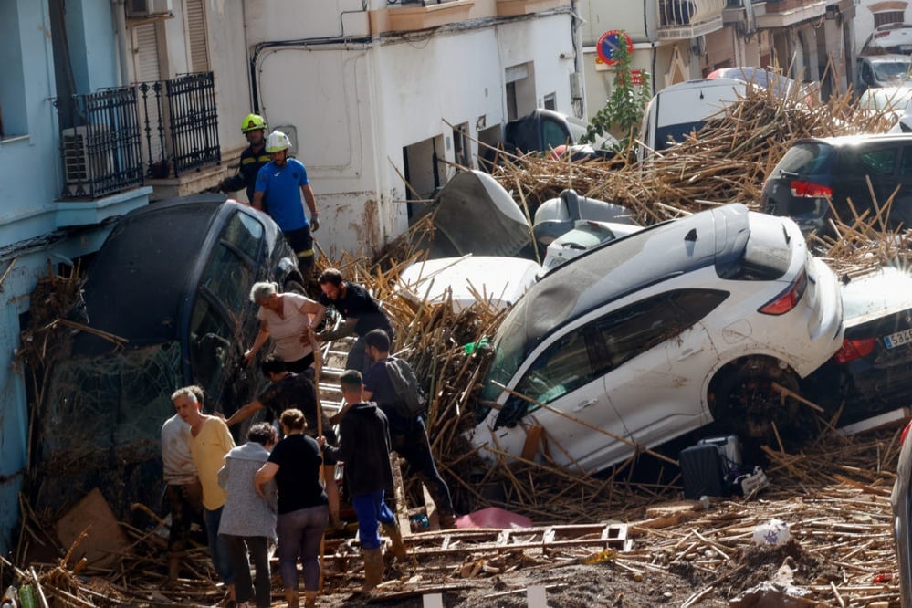 At least 140 killed in Spain after floods as authorities continue search for bodies