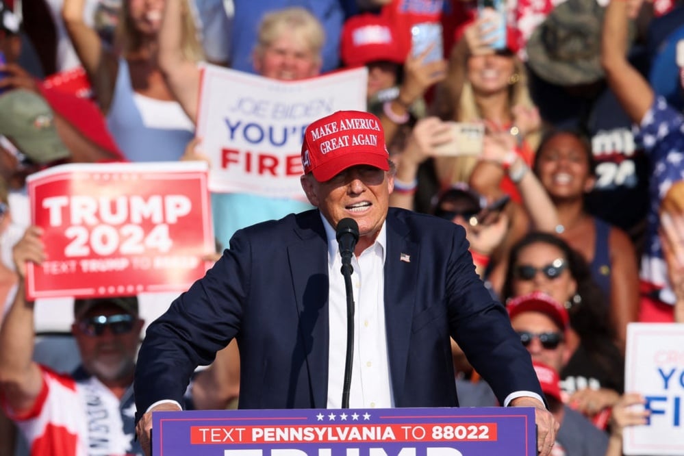 Trump rallies in Butler, emphasizing resilience after violent assassination attempts.