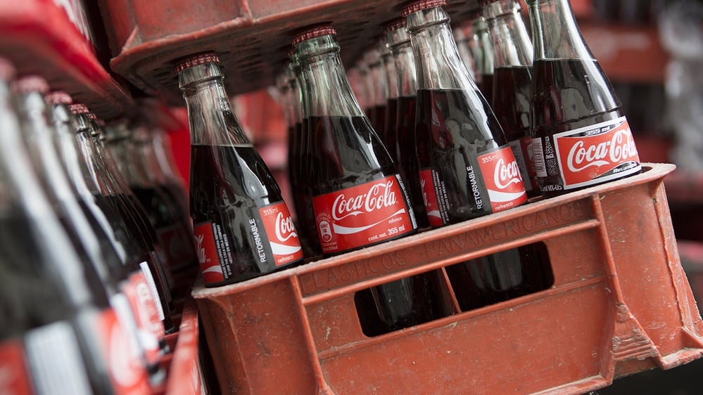 Coca-Cola raises annual sales, profit forecasts on steady demand