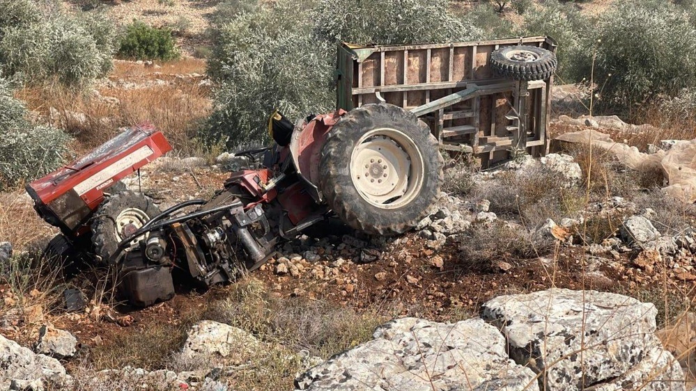 Israeli settler militias destroyed three tractors belonging to Palestinian farmers as they harvested olives in their own land in the village of