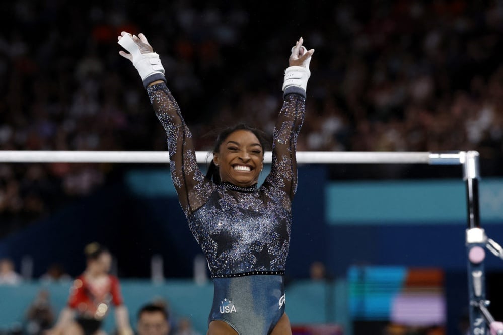 Simone Biles wins gold, overcoming past struggles