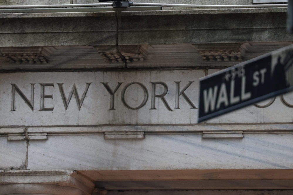 Stocks rally, recover all of Monday's slide as the dollar and U.S. bond market steady