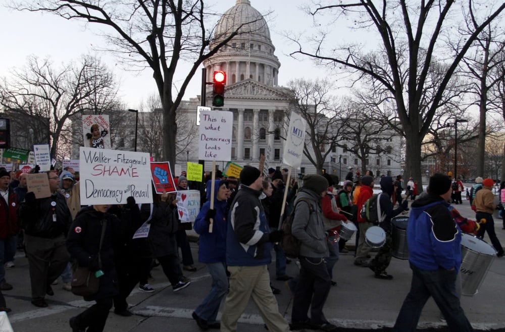 A judge's ruling reinstates collective bargaining rights for Wisconsin public sector workers.