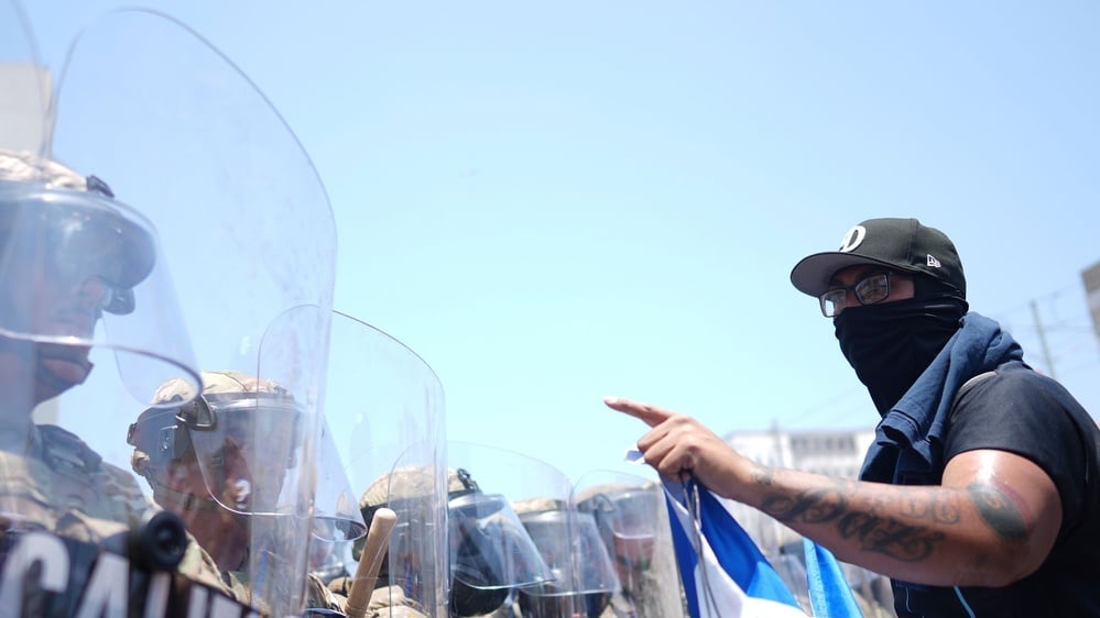 Trump deploys National Guard to Los Angeles following ICE raids, escalating tensions.